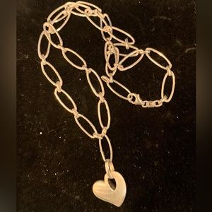 Sterling silver paperclip chain necklace with drop heart. Brand new. Beautiful.